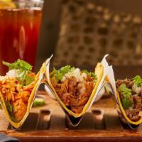 Taco Trio · Your choice of three tacos!!.