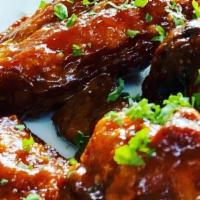 Chicken Wings · Choice of BBQ, Buffalo, Mango Habanero, Garlic Parmesan or Plain