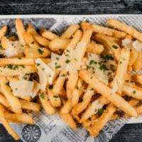 Truffle Fries · House fries tossed with shaved parmesan and truffle oil