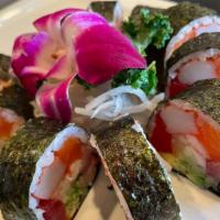 Futomaki Roll · Tuna, salmon, yellowtail, crab, shrimp, cucumber, avocado & masago.