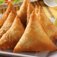Vegetable Platter · Traditionally prepared combination of assorted vegetable samosas with a choice of mixed pako...