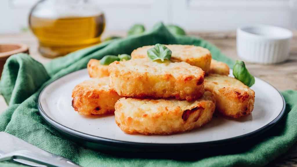 Hash Brown · Traditionally prepared dish made with fried potatoes until they are golden brown and crispy. Two pieces of family size, served with special sauce on the side.