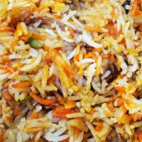 Chicken Biryani · Marinated chicken cooked with basmati rice & spices