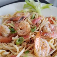 Shrimp Scampi · Sauteed jumbo shrimp, white wine, herbs, scallion, tomatoes, garlic, Served over Linguine