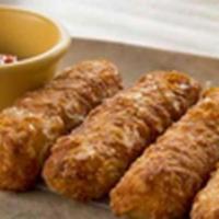 Tequeños · guayanés cheese wrapped in crisp dough and served with chipotle ketchup.