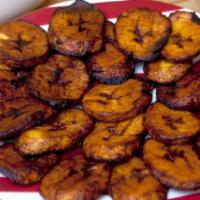 Fried Plantains · Sweet fried plantains with a side of sour cream.