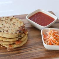 Pupusas · One Pupusas stuffed with cheese ad your choice of pork, beans, loroco, or just cheese. Serve...