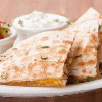 Quesadilla (Steak Or Chicken) · A flour tortilla stuffed with cheese and your choice of steak or chicken. Served with a side...
