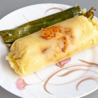 Chicken Tamale (Salvadoran Style) · One tamale made of ground corn filled with a mix of seasoned chicken and potatoe. Wrapped in...