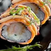 Salmon Grill Roll · 8 pieces. Rice, nori, shrimp tempura, cream cheese, grilled salmon, mayo, sesame, and eel sa...