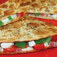 Mediterranean Quesadilla · Vegetarian. Roasted red peppers, basil, red onions, black olives, green peppers and feta che...