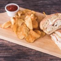 Chicken Cordon Bleu · Grilled chicken, ham, sharp provolone, and blue cheese dressing. Served with a side of waffl...