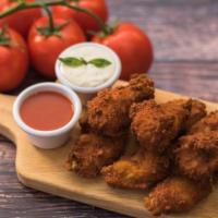 Wing Zings · 10 of our famous mild breaded wings served with sauce on the side.