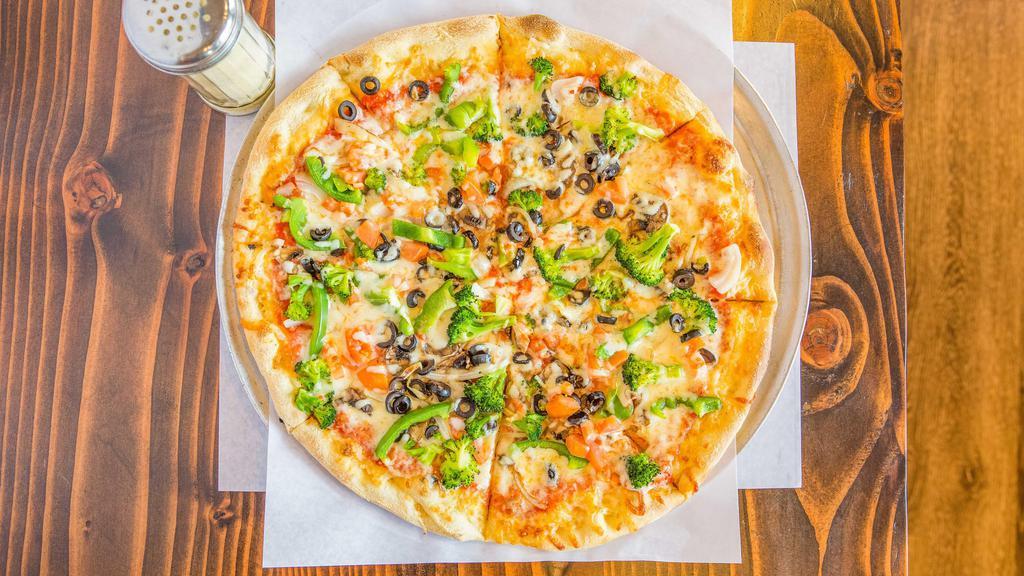Veggie Pizza · Mushrooms, onions, peppers, olives, broccoli, fresh tomatoes, sauce, and mozzarella.