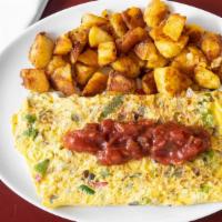 Spanish Omelet · Peppers, onions, scallions and a seasoned three cheese blend. Topped with salsa and a side o...