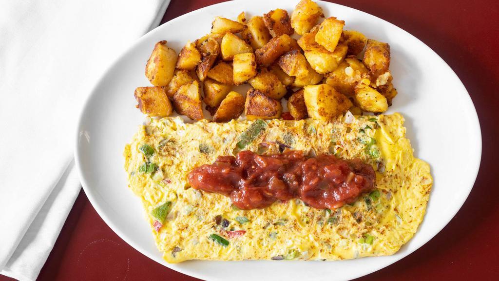 Spanish Omelet · Peppers, onions, scallions and a seasoned three cheese blend. Topped with salsa and a side of sour cream.