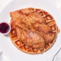 Chicken And Waffle · Southern fried boneless chicken breast & cheddar waffle, syrup, red raspberry jam, powder su...