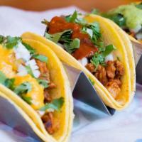 Tacos (3) · Three tacos served on double corn tortillas, with your choice of protein, onion, cilantro an...