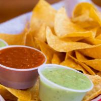 Chips & Salsa · Fresh Homeade Chips served with Spicy Red Salsa and Guacamole Salsa