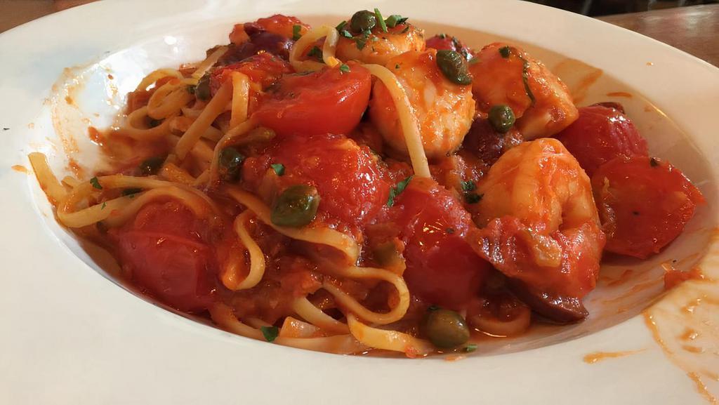 Shrimp Scallop Puttanesca · Linguine with Sautéed Shrimp, Sea Large Scallops, Garlic, Olives, Capers & Anchovies, tossed with Tomato Basil Sauce