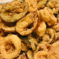Calamari · Fried Calamari Rings tossed with Spicy Cherry Peppers, Served with Aioli Dipping Sauce