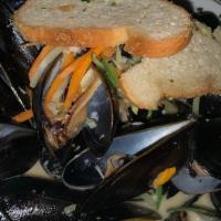 Mussels Bianco Or Fra Diavolo · P.E.I. Mussels, Sautéed with Vegetables, White Wine or Spicy Tomato Sauce