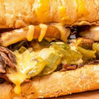 Supreme Cheesesteak · 100% ribeye steak on a fresh amoroso roll with mushrooms, green peppers, grilled onions, pro...