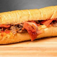 Pizza Cheesesteak · Your choice of 100% ribeye steak or chicken on a fresh amoroso roll with provolone cheese an...