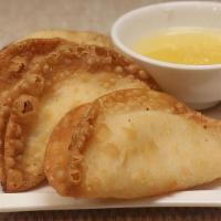 Crab Rangoon · A mixture of crabsticks and cream cheese in crispy dough,  pineapple sauce. We have one of t...