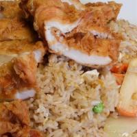 Gai Grob Fried Rice · A special house fried rice topped with crispy chicken, sweet sauce on . the side.