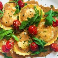 New Lobster Ravioli With Black Pepper Cream Sauce · Lobster ravioli, roasted grape tomatoes, arugula, garlic, black pepper sauce. Available only...