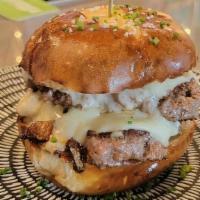 Smash Burger · double patty smash burger, 2 slices of American, onions, mayo, pretzel bun