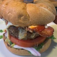 Old School Burger · 9 oz of angus beef on a home-made roll. Served with lettuce, tomato, onion, and your choice ...