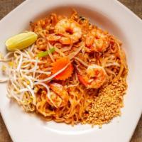 Pad Thai · Stir-fried thai noodles with egg crushed peanut scallion bean curd and bean sprout. served o...