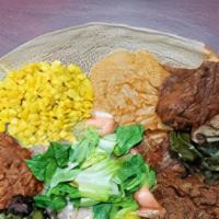 Taste Of Habesha (Meat & Veggie Combo 2) · Mild and spicy. Spicy lentils, yellow peas, collard greens, salad, key wot, alicha, gomen be...