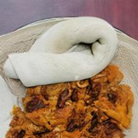 Quanta Fir Fir · Spicy. Spicy. Dried beef jerky in spicy wot stew mixed with injera.