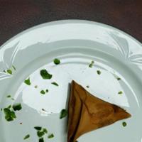 Sambusa Lentils · Crispy pastry triangle shaped filled with lentils spiced with onion, garlic, andJalapeño pep...