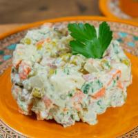 Olivier Salad · Gluten free. Salad with peas, potatoes, beef, carrots. Disclaimer: our gluten-free items are...