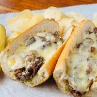 Short Rib Cheesesteak · Caramelized onion, long hots, white cheddar, horseradish aioli.