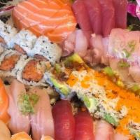 Sushi, Sashimi, And Maki Platter · Rainbow roll, caterpillar roll, spicy tuna roll, shrimp tempura roll, california roll, two p...