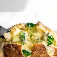 Loaded Brócoli And Cheddar Loaded Potato  · Loaded brócoli and cheddar baked  potato