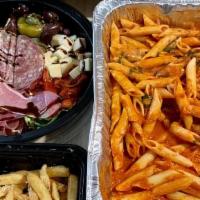Chicken Piccata Family Dinner · A family style dinner that serves upto 5 guests.  Antipasti tray, Caesar salad,  penne pasta...