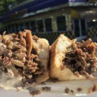 Philly Cheesesteak Wrap With Ff · Philly steak, sautéed onions and melted cheese wrapped in a soft tortilla.