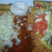 Pepe'S Combo · One chicken and one beef taquito mexicano, one chicken enchilada topped with onions, and che...