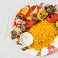 Lamb Kabob · Grilled chunks of lamb marinated in savory spices and herbs.