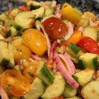 Shepherd'S Salad Bowl · cherry tomatoes, cucumber, red onion, cilantro, serrano pepper, pomegranate vinaigrette