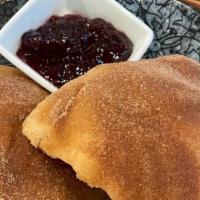 Sufganiyah · cinnamon sugar fried dough, served with jam of the day and lemon honey butter