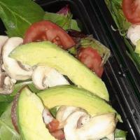 Vegan Salad · Spring Mix Salad with avocados, mushrooms, cucumber, tomato.
