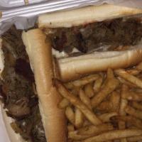 Cheesesteak · A cheesesteak is a sandwich made from thinly sliced pieces of beefsteak and melted cheese in...