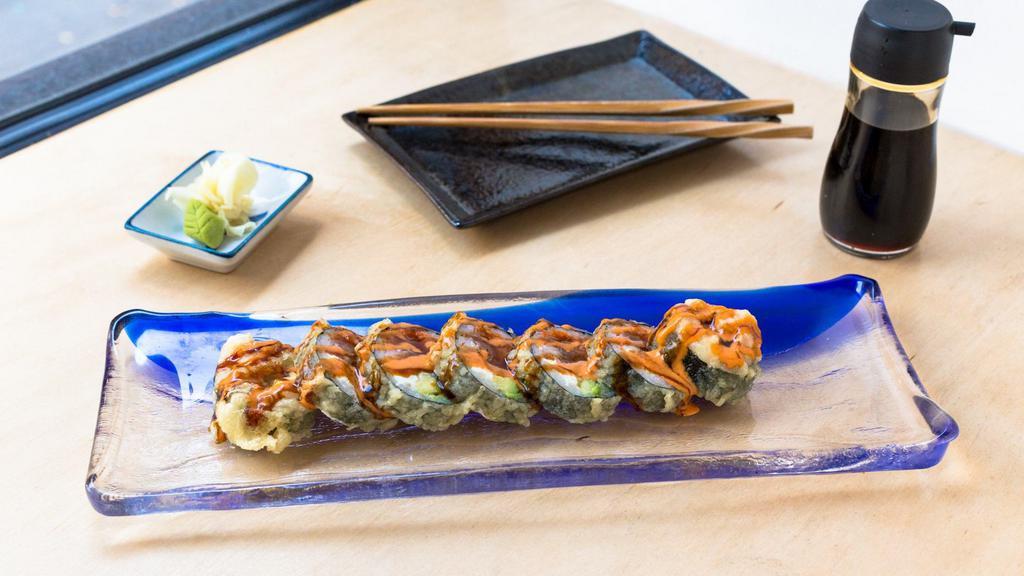 Tnt Roll · Kani, tuna, salmon, cream cheese, avocado and masago tempura style served with spicy mayo and eel sauce. Includes ginger and wasabi.